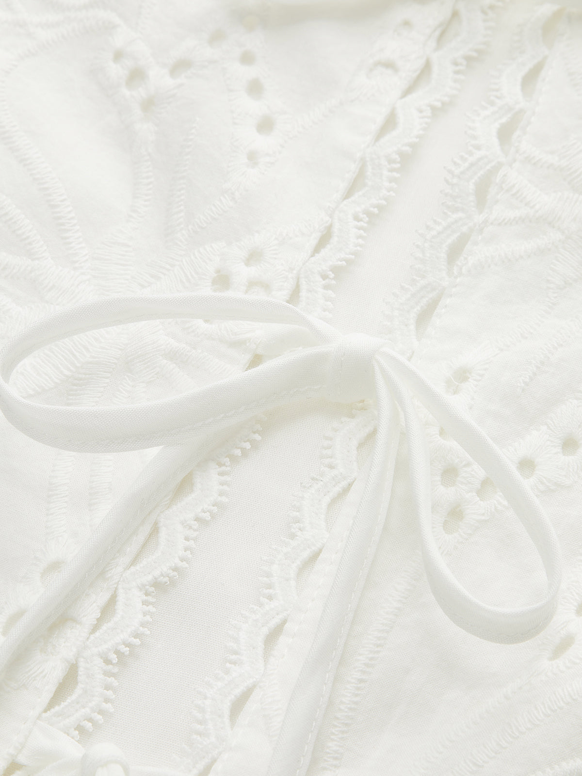 Sleeveless Eyelet Lace-Up Crop Top