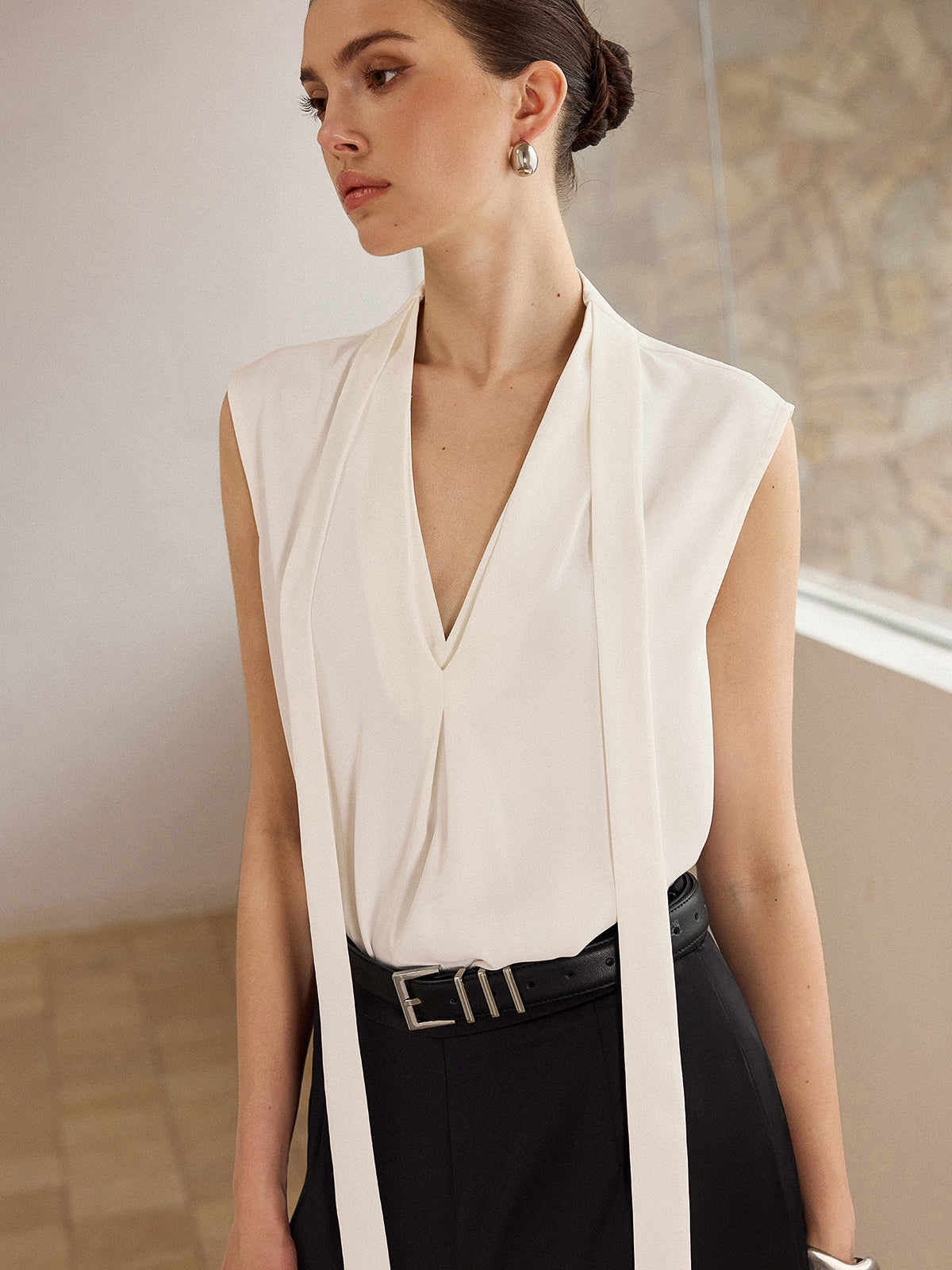 Sleeveless Blouse with Tie-Neckline