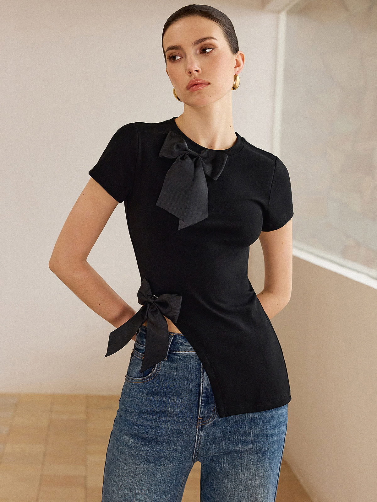 3D Bow-Detailed Top with Asymmetric Hem