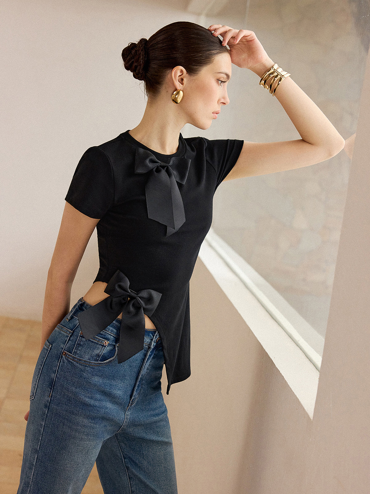 3D Bow-Detailed Top with Asymmetric Hem