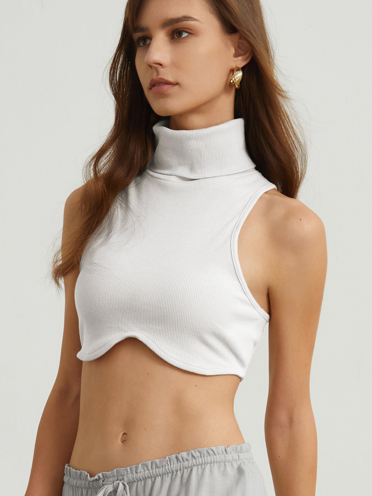 Wave Hem Mock Neck Crop Top
