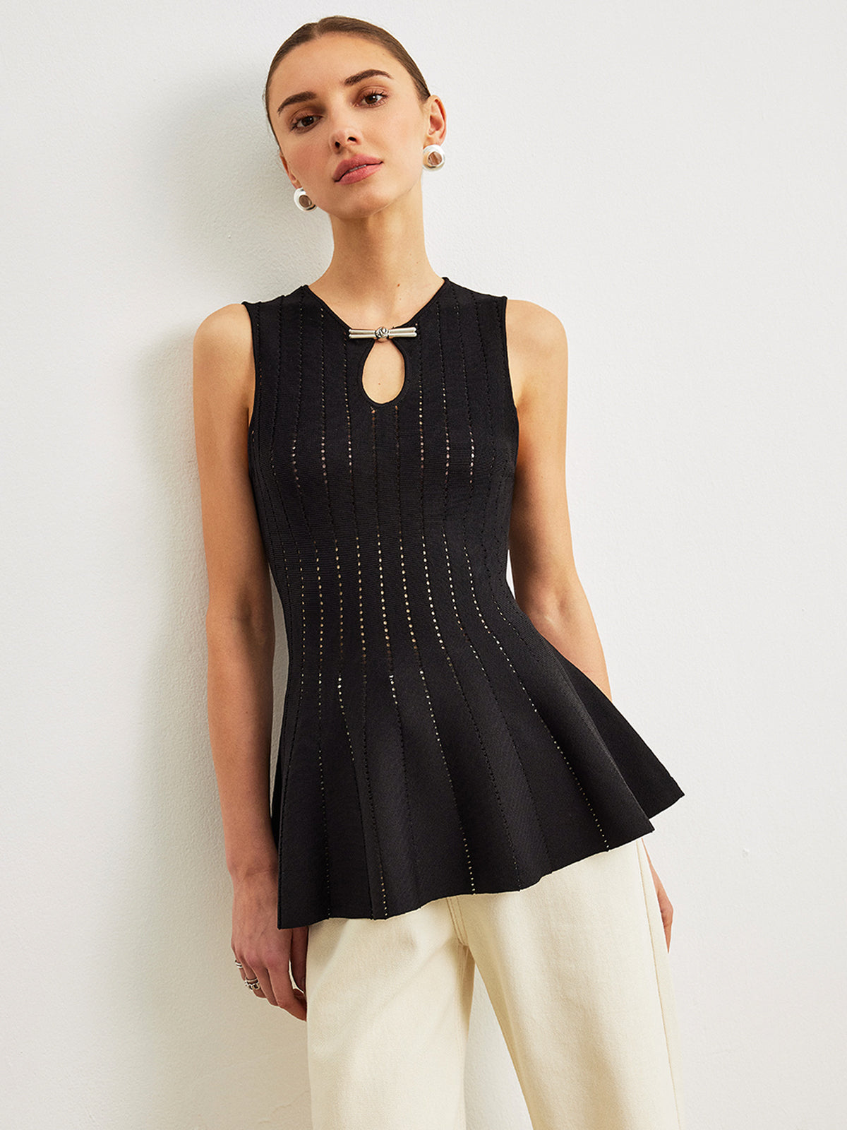 Semi-Sheer Knit Peplum Top With Bow Detail