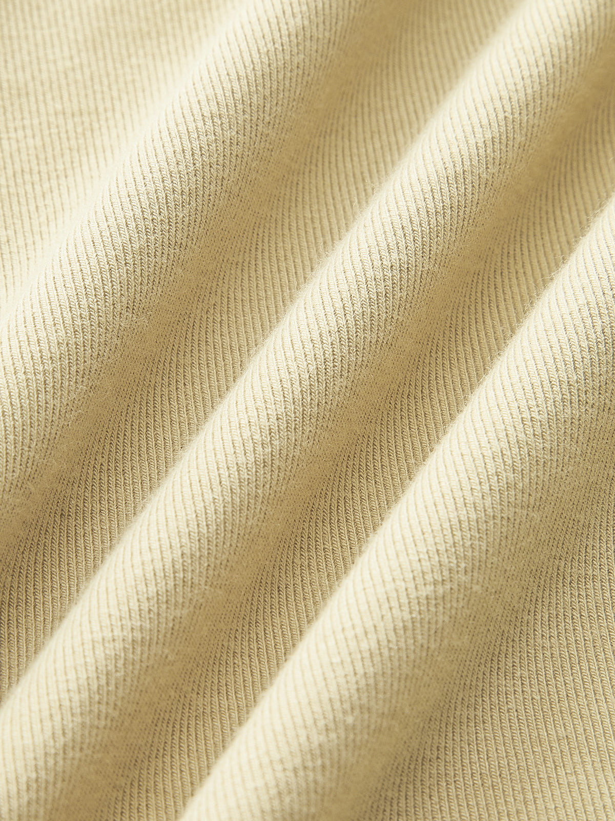 Asymmetrical Ruched Top with Decorative Pin