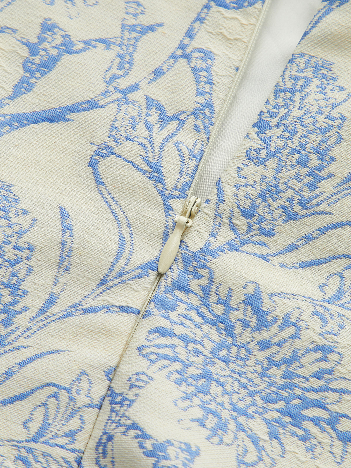 Floral Printed Sleeveless Dress with Pleated Hem